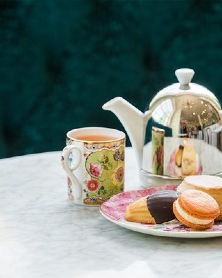 Jolie Tea plate with tea cakes, a mug of tea and tea pot