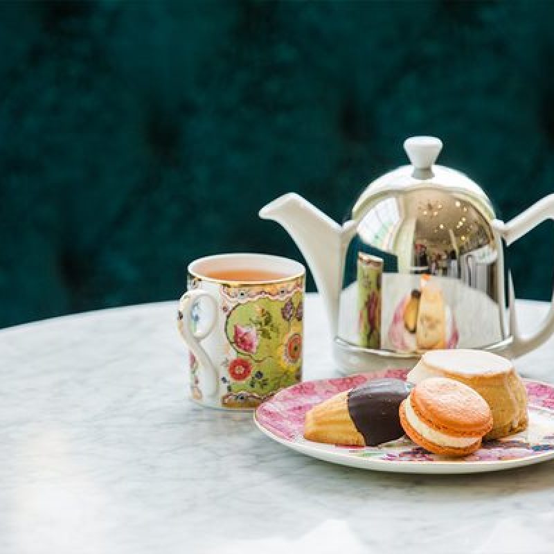 Jolie Tea plate with tea cakes, a mug of tea and tea pot