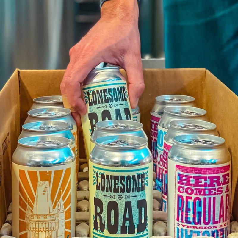 Cans of beer from Notch Brewing