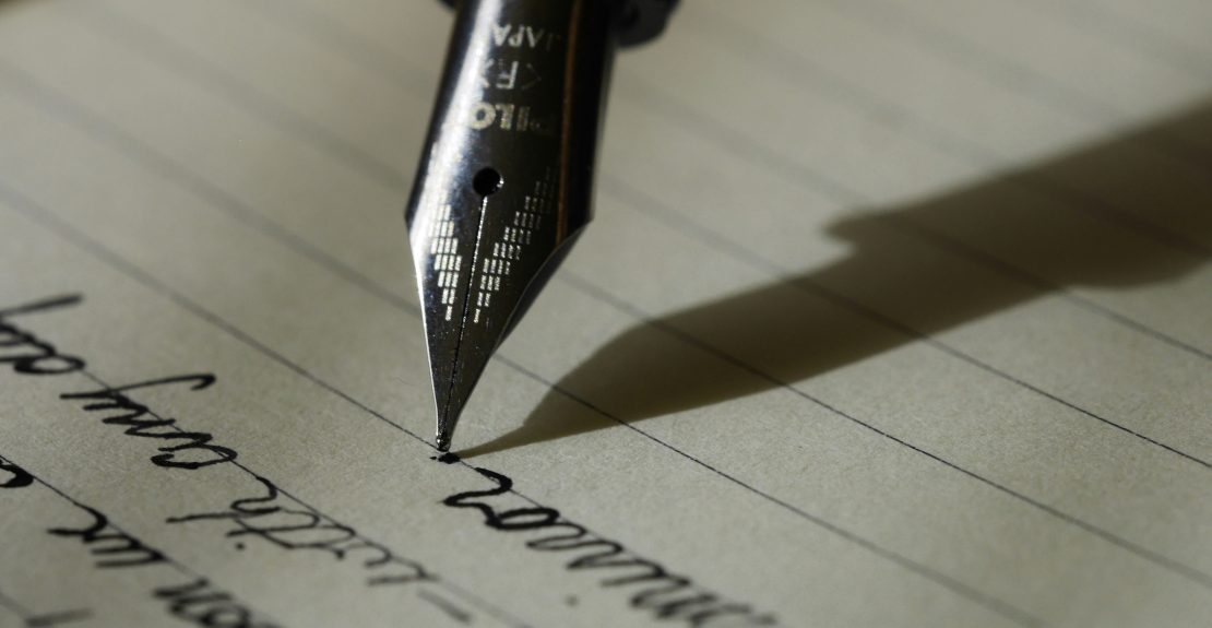 Photo of cursive words written with a fountain pen