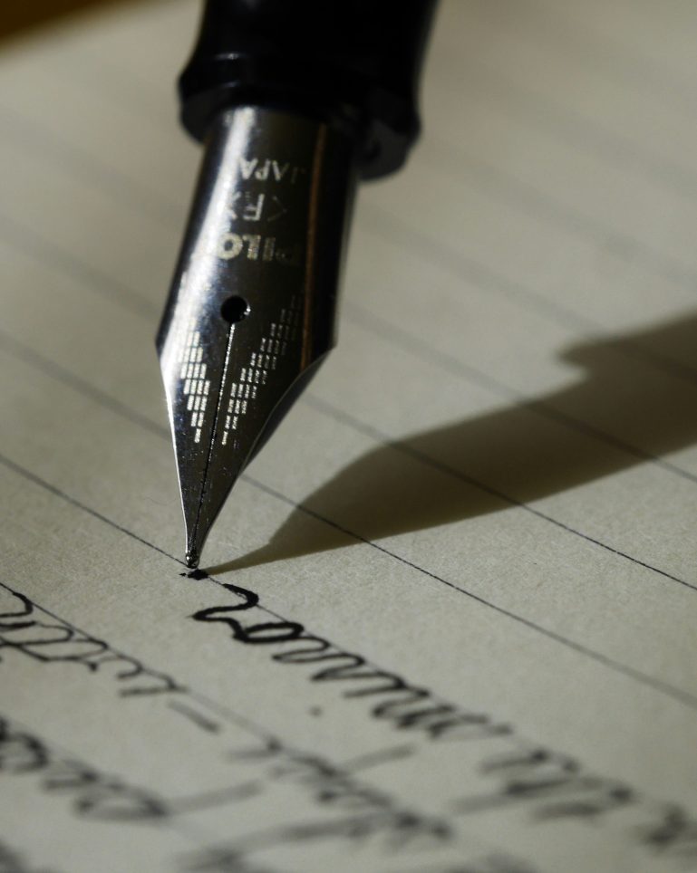 Photo of cursive words written with a fountain pen